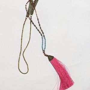 Pink tassel necklace with bronze accents